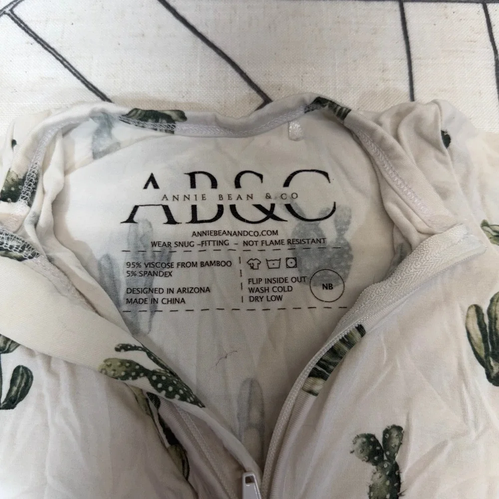 Annie Bean & Co Bamboo Sleeper NB White Cactus Print Two-Way Zip Footie